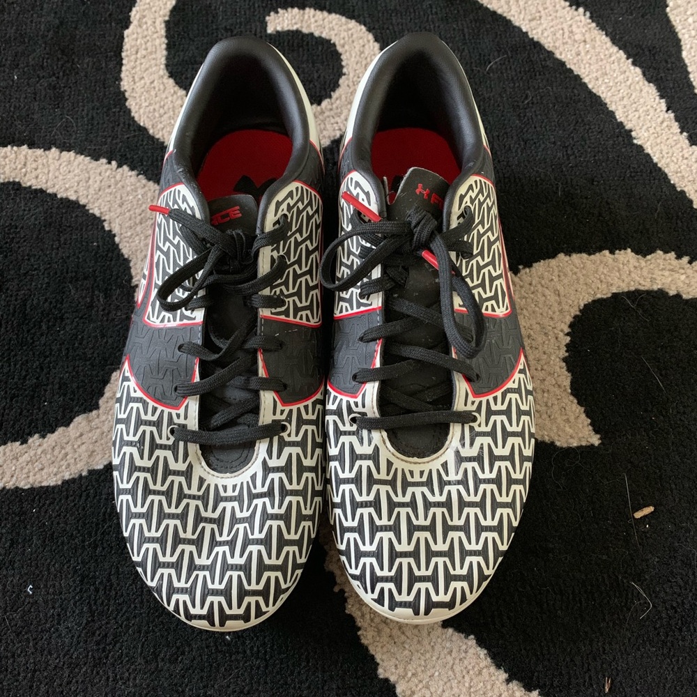 Under Armour size 8.5 rubber spiked cleats.